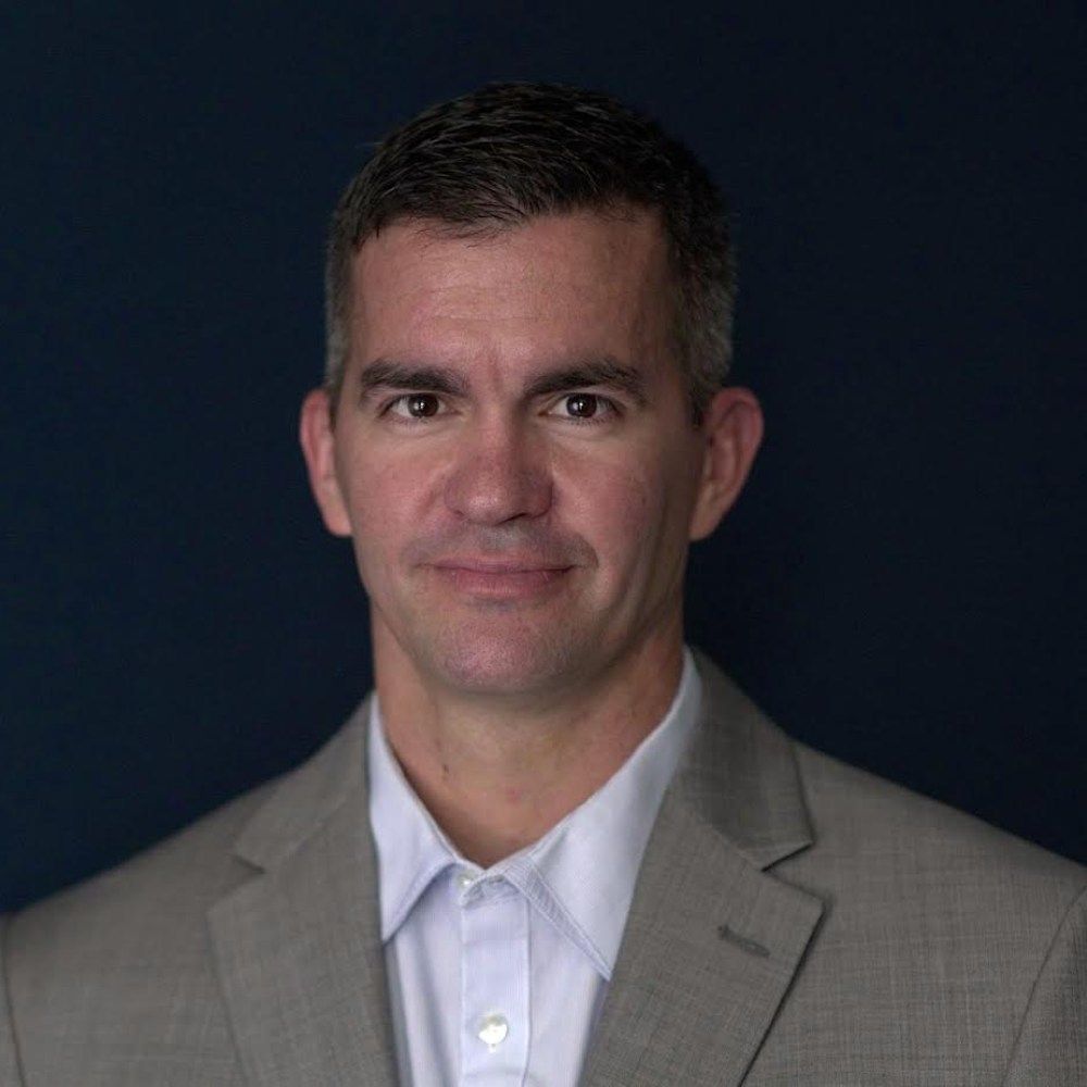 Man in grey suit Man in grey suit